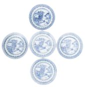 Five Chinese porcelain plates each painted in blue with two figures beside a lakeside temple,