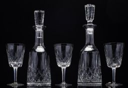 A cased set of Waterford Crystal Lismore pattern wine goblets and decanters,