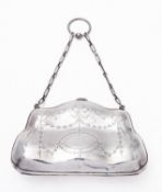 An early 20th century silver purse, marks almost rubbed out, London, of typical form,