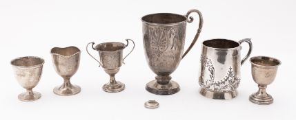A mixed group of silver including; a Victorian christening mug by Thomas White, Birmingham 1863,