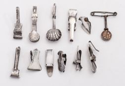A mixed group of silver napkin clips; various designs and makers, 60gms.