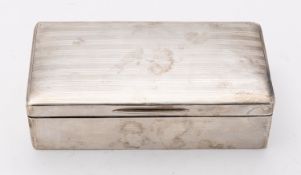 A George V silver cigarette casket makers mark rubbed, London 1920, of rectangular form,