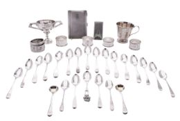 A mixed lot of silver, comprising of a trophy cup, christening mug, 4 napkin rings,
