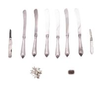 A George V set of six silver dessert knives, with loaded handles and steel blades,