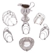 A George III silver cream jug, baluster form, with bead borders,