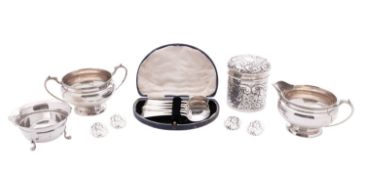 A small mixed lot of silver, a sugar bowl & matching milk jug with a corded border,
