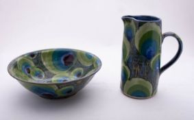 Dartington Pottery four stoneware pieces comprising a plate,