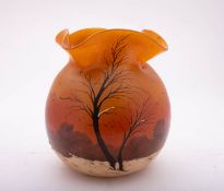 A Legras glass vase of spherical form with crimped rim the orange body enamelled with a snowy