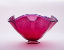 Bob Crooks First Glass bowl, of footed crimped form the red body with amethyst linear trails,