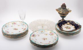 Eleven English porcelain dinner plates,