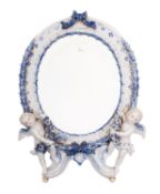 A Helena Wolfsohn porcelain mirror, the