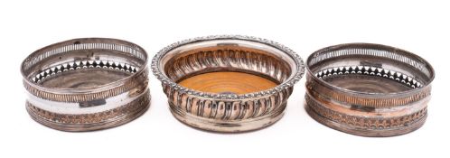 A pair of George III Sheffield plate decanter coasters, not marked, reeded rim, pierced border,