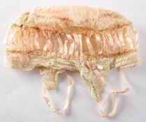 A 19th Century inner silk bonnet. Having