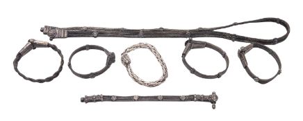 Indian silver jewellery: a necklace and 6 bracelets, all unmarked c.1900; the necklace 30