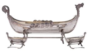 A silver plated centrepiece, in the form of a Viking longship,
