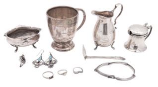 A small mixed lot of silver, to include a christening cup, a mustard pot, a salt, a milk jug,