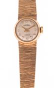 Gradus a 9K gold lady's wristwatch the round silvered dial signed Gradus, 17 Jewels, Incabloc,