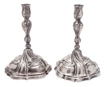 A pair of early 19th century German silver candlesticks,