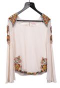 Matthew Williamson, A cream silk blouse with bell sleeves,