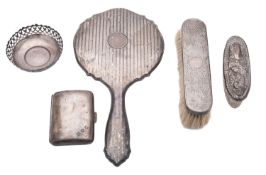 A small mixed lot of silver, to include a hand mirror, a brush, a mounted glass jar,