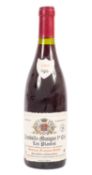 A bottle of Chambolle Musigny prem. Cru Les Plantes 1997. 75cl, 13% vol.