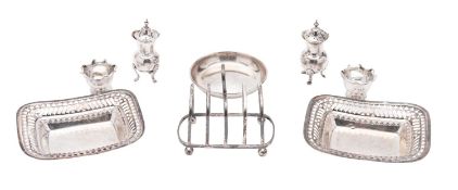 A small mixed lot of silver, to include a pair of pierced bonbon dishes, a toast rack,