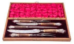 A late 19th/ early 20th century cased four-piece carving set, Onslow pattern,