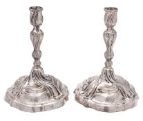 A pair of late 18th/ early 19th century continental silver candlesticks,