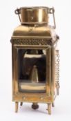An 19th/early 20th century brass hand lamp, unsigned,