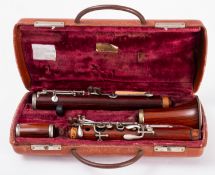 A Rampone ebonised wooden clarinet.