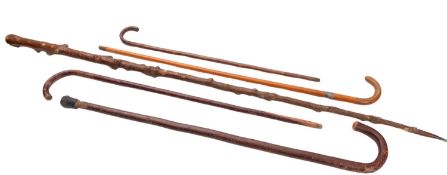 An early 20th Century silver mounted Shepherds Crook walking stick.