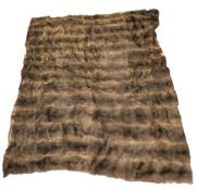 A 20th Century brown fur blanket. With black polyester lining, 199cm x 163cm.