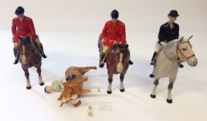 Four Beswick mounted hunting figures.