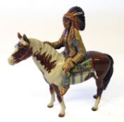 A Beswick mounted Native American figure. 23cm high.