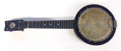 An early 20th Century four string Keech banjulele.
