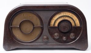 An early 20th century Ekco AC86 Bakelite radio.