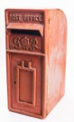 A George VI cast iron pillar mounted post box.