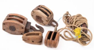 Two large double blocks, one with iron hook, together with four other various blocks.