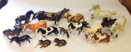 A collection of seventeen Beswick horses. In a range of colours and sizes, some damaged.