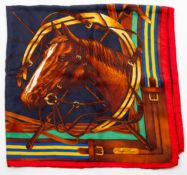 A Ralph Lauren equine scarf, having a horses head on a blue ground with red border, 91cm, 85cm.