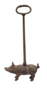 An early 20th Century cast iron door stop in the form of a pig. 53cm high.