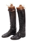 A pair of black leather riding boots with Maxwell of London wooden trees, length of sole 27cm,