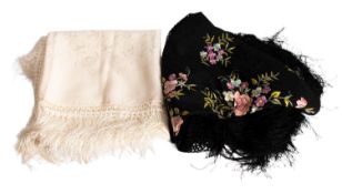 A late 19th /early 20th century black silk embroidered shall,