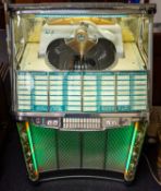 A 1957 Rudolph Wurlitzer Company model 2104 Multi Selecter Phonograph.