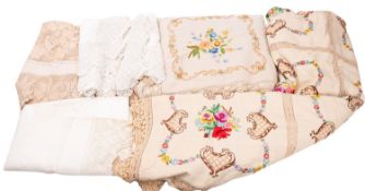 Two Victorian embroidered bedspreads.