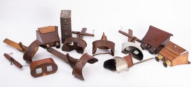 A group of three various Brewster pattern stereograph viewers and six Holmes pattern stereograph