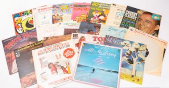 A group of thirty-four LP records: comprising Hits compilations, Classical music, Shows,