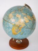 A Danish 12 inch 'Scan-Globe', with relief moulded paper gores on a brass meridian and wooden base,
