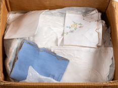 A collection of mainly embroidered linens.