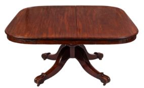 A Victorian mahogany dining table, the r